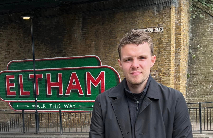 Charlie by the Eltham sign at Eltham Station