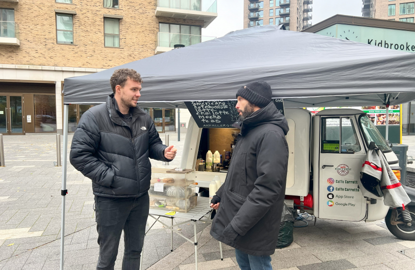 Charlie with Stefano, a trader in Kidbrooke Village